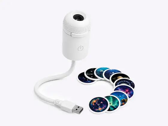Official StarNest product image showing the USB projector and projection film discs