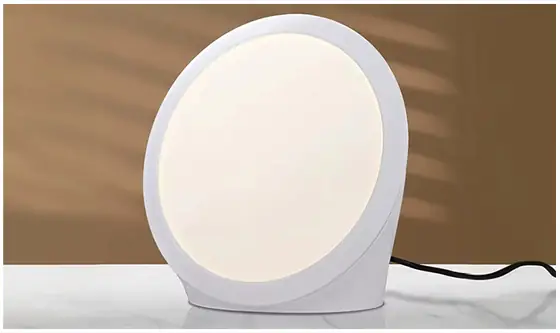 Official close view of the round white Sunniva Light lamp